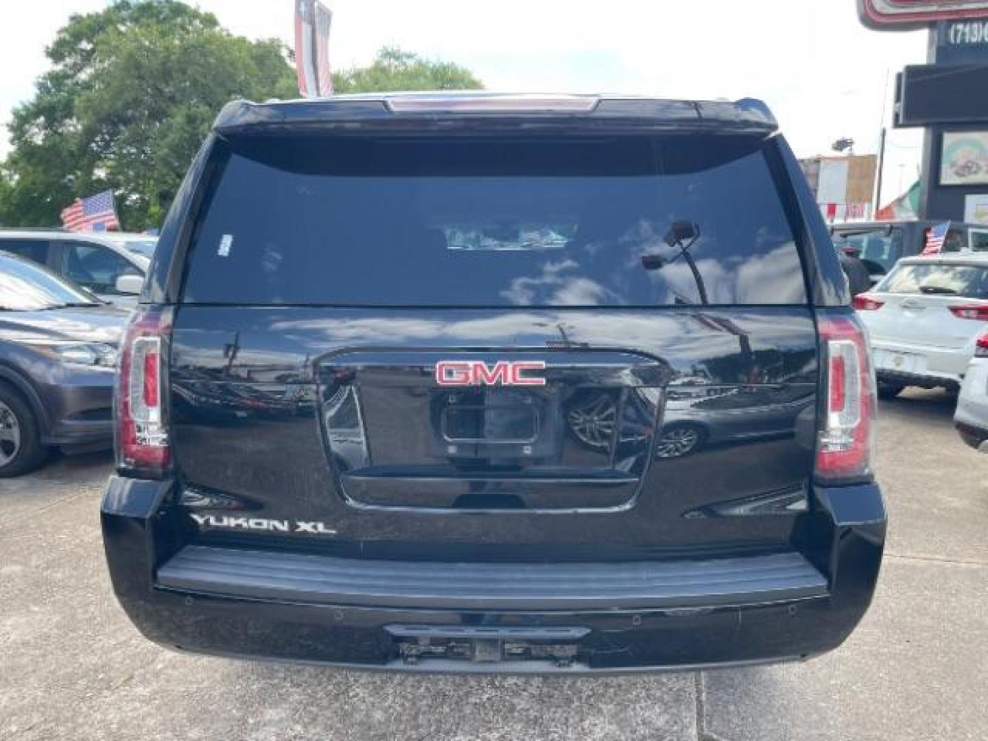 2016 Onyx Black GMC Yukon XL SLE (1GKS1FKC6GR) with an EcoTec3 5.3L V-8 gasoline direct injection engine, located at 7935 Gulf Freeway, Houston, 77017, (832) 266-1645, 29.684393, -95.275665 - Photo#5