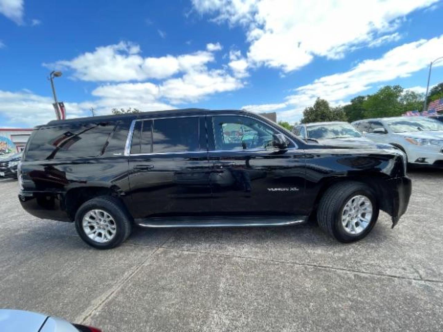 2016 Onyx Black GMC Yukon XL SLE (1GKS1FKC6GR) with an EcoTec3 5.3L V-8 gasoline direct injection engine, located at 7935 Gulf Freeway, Houston, 77017, (832) 266-1645, 29.684393, -95.275665 - Photo#7