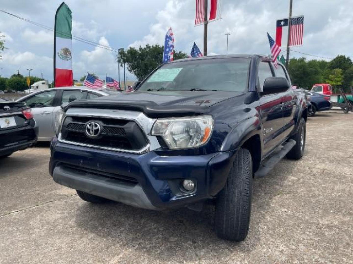 2013 Nautical Blue Metallic Toyota Tacoma PreRunner V6 (5TFJU4GN3DX) with an 4L V-6 DOHC engine, located at 7935 Gulf Freeway, Houston, 77017, (832) 266-1645, 29.684393, -95.275665 - Photo#2
