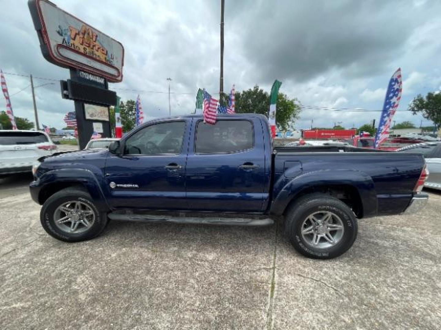 2013 Nautical Blue Metallic Toyota Tacoma PreRunner V6 (5TFJU4GN3DX) with an 4L V-6 DOHC engine, located at 7935 Gulf Freeway, Houston, 77017, (832) 266-1645, 29.684393, -95.275665 - Photo#3