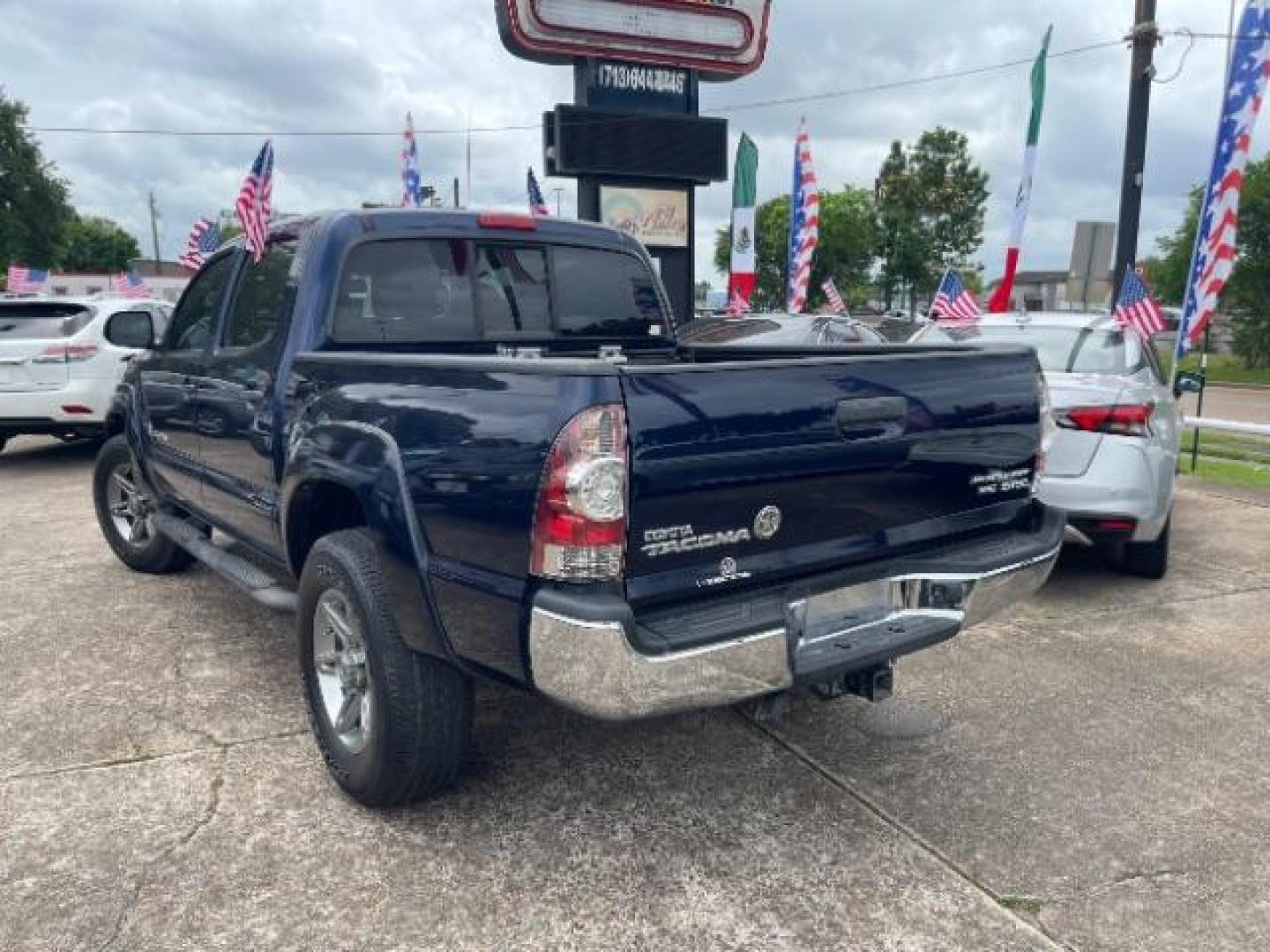 2013 Nautical Blue Metallic Toyota Tacoma PreRunner V6 (5TFJU4GN3DX) with an 4L V-6 DOHC engine, located at 7935 Gulf Freeway, Houston, 77017, (832) 266-1645, 29.684393, -95.275665 - Photo#4