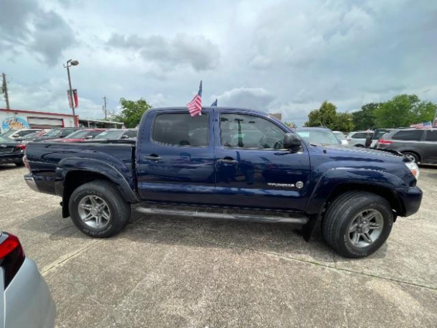 2013 Nautical Blue Metallic Toyota Tacoma PreRunner V6 (5TFJU4GN3DX) with an 4L V-6 DOHC engine, located at 7935 Gulf Freeway, Houston, 77017, (832) 266-1645, 29.684393, -95.275665 - Photo#7