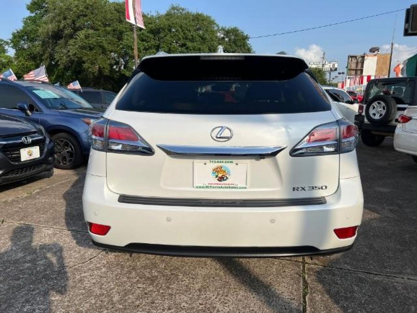 2014 Starfire Pearl /BLACK Lexus RX 350 FWD (JTJZK1BAXE2) with an 3.5L V6 DOHC 24V engine, 5-Speed Automatic transmission, located at 7935 Gulf Freeway, Houston, 77017, (832) 266-1645, 29.684393, -95.275665 - Photo#5