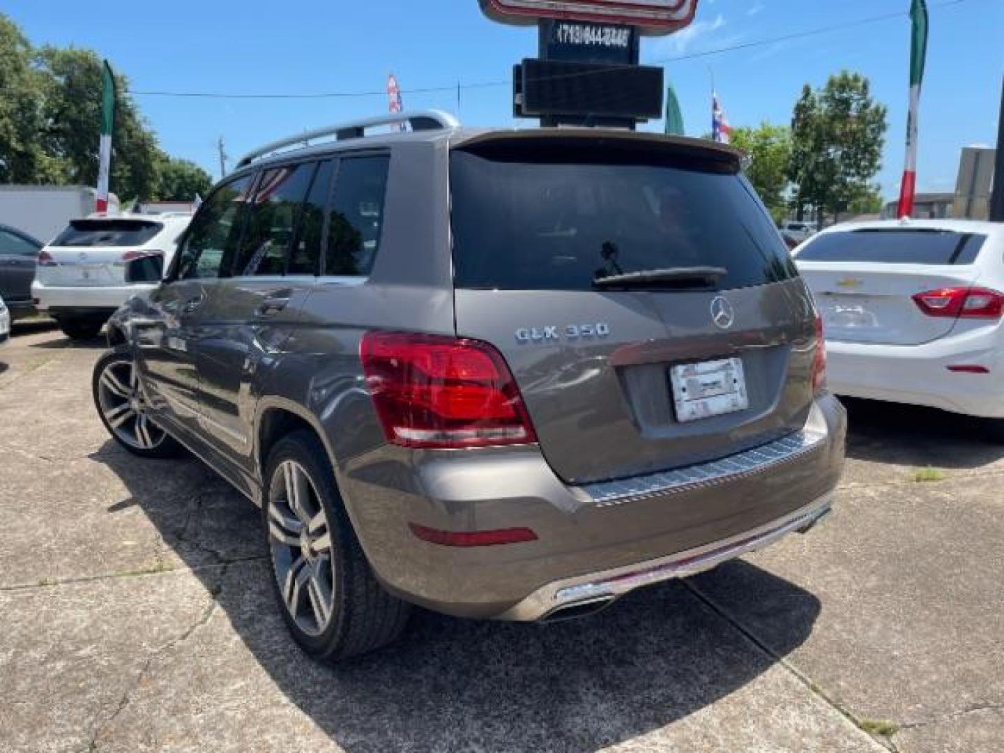 2015 Dolomite Brown Metallic Mercedes-Benz GLK-Class GLK350 (WDCGG5HB7FG) with an 3.5L V6 DOHC 24V engine, 7-Speed Automatic transmission, located at 7935 Gulf Freeway, Houston, 77017, (832) 266-1645, 29.684393, -95.275665 - Photo#4
