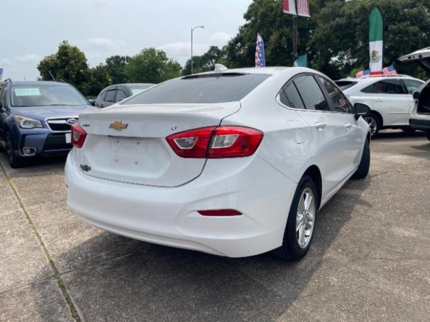 2018 Summit White Chevrolet Cruze LT Auto (1G1BE5SM0J7) with an 1.4L I-4 gasoline direct injection engine, located at 7935 Gulf Freeway, Houston, 77017, (832) 266-1645, 29.684393, -95.275665 - Photo#6