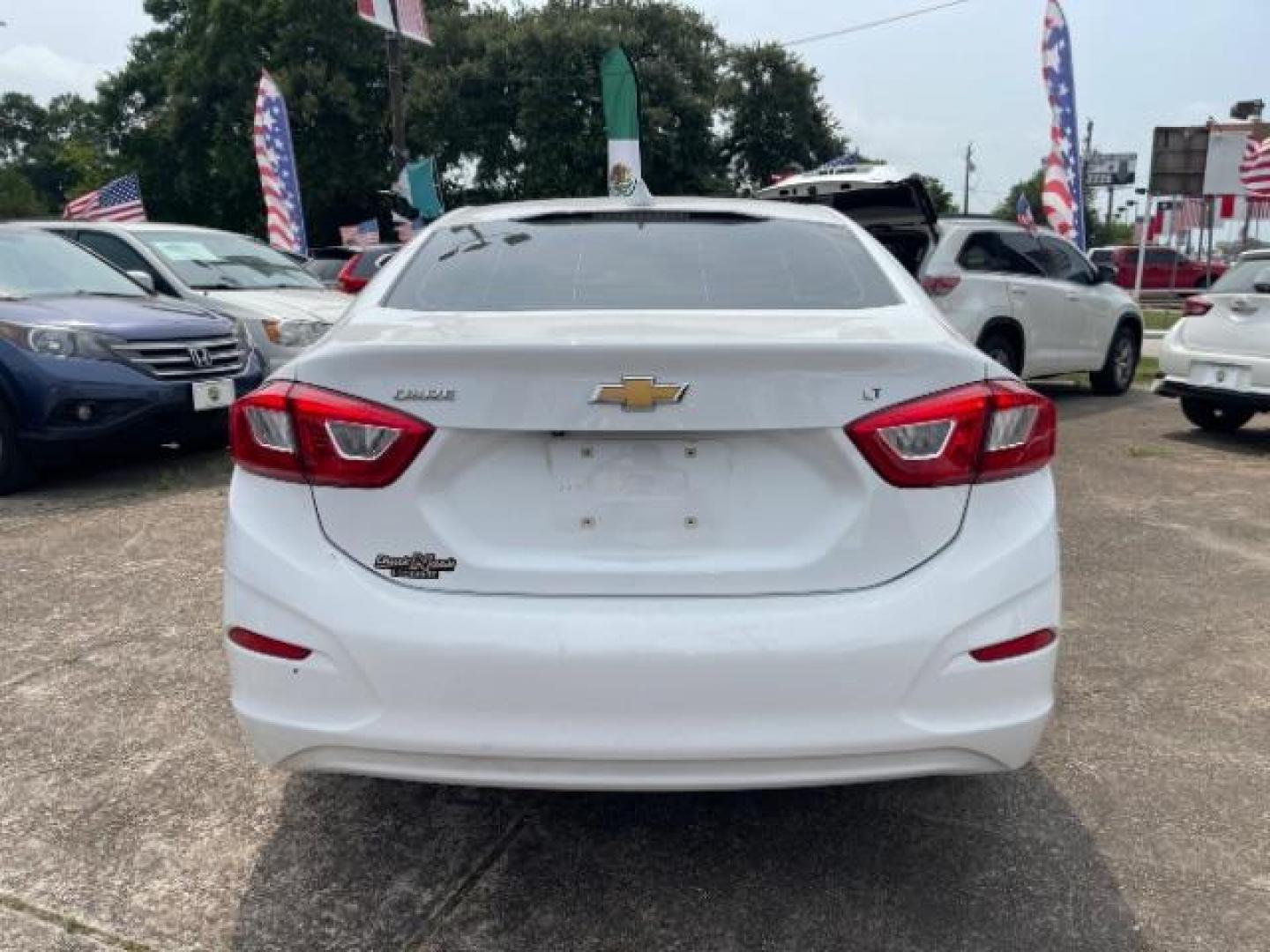 2018 Summit White Chevrolet Cruze LT Auto (1G1BE5SM0J7) with an 1.4L I-4 gasoline direct injection engine, located at 7935 Gulf Freeway, Houston, 77017, (832) 266-1645, 29.684393, -95.275665 - Photo#20