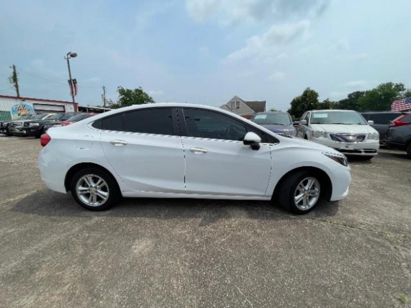 2018 Summit White Chevrolet Cruze LT Auto (1G1BE5SM0J7) with an 1.4L I-4 gasoline direct injection engine, located at 7935 Gulf Freeway, Houston, 77017, (832) 266-1645, 29.684393, -95.275665 - Photo#22