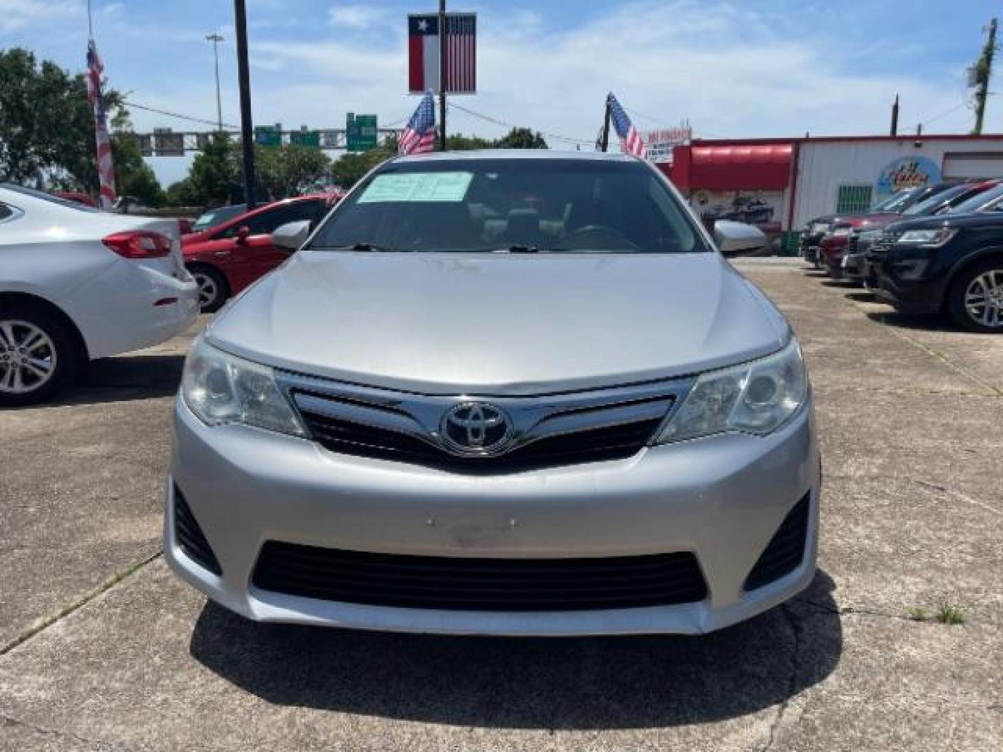 2014 Classic Silver Metallic Toyota Camry LE (4T4BF1FK8ER) with an 2.5L I-4 DOHC engine, located at 7935 Gulf Freeway, Houston, 77017, (832) 266-1645, 29.684393, -95.275665 - Photo#1