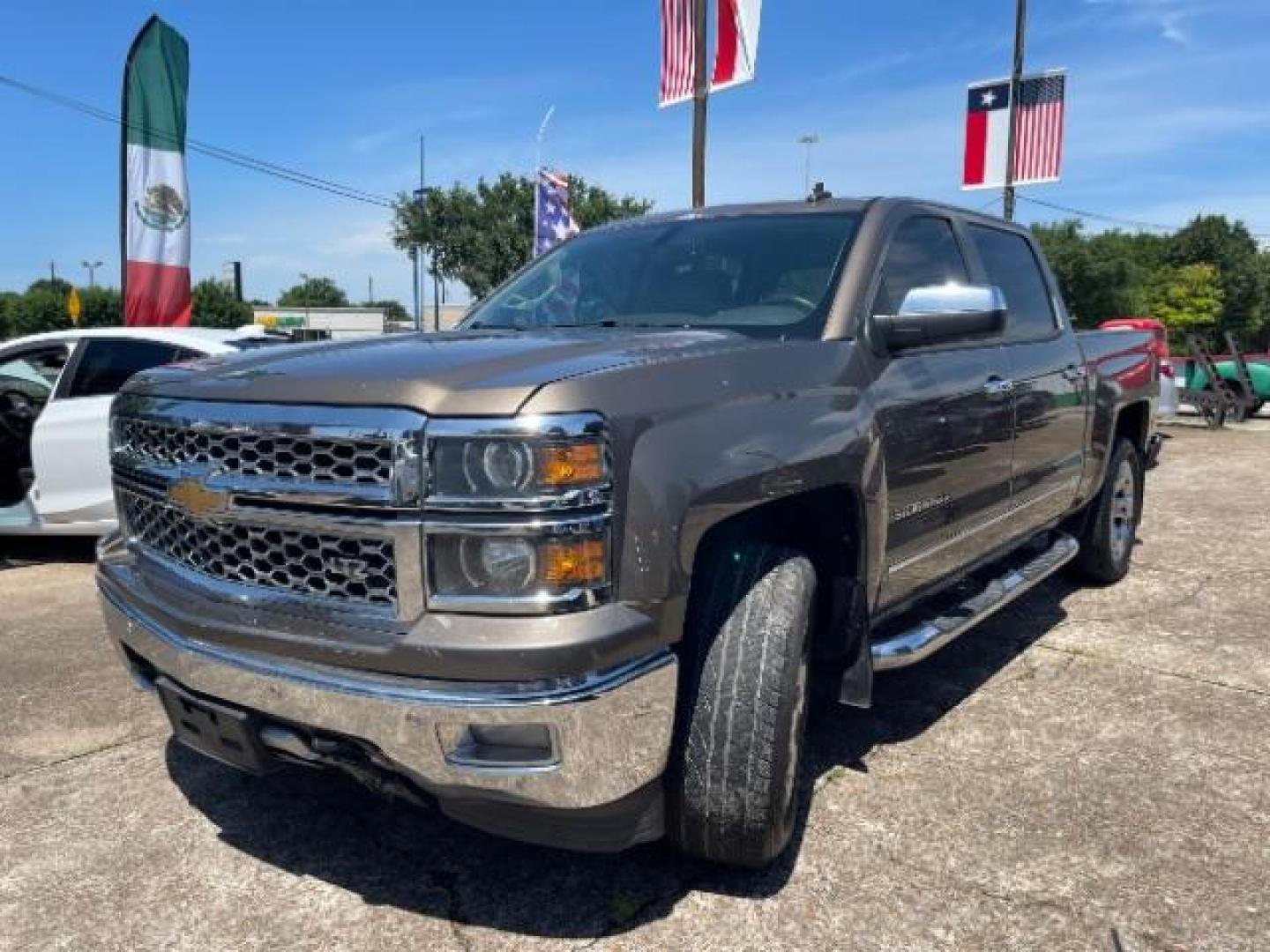 2014 Brownstone Metallic Chevrolet Silverado 1500 1LZ (3GCUKSEC3EG) , located at 7935 Gulf Freeway, Houston, 77017, (832) 266-1645, 29.684393, -95.275665 - Photo#2