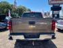 2014 Brownstone Metallic Chevrolet Silverado 1500 1LZ (3GCUKSEC3EG) , located at 7935 Gulf Freeway, Houston, 77017, (832) 266-1645, 29.684393, -95.275665 - Photo#5