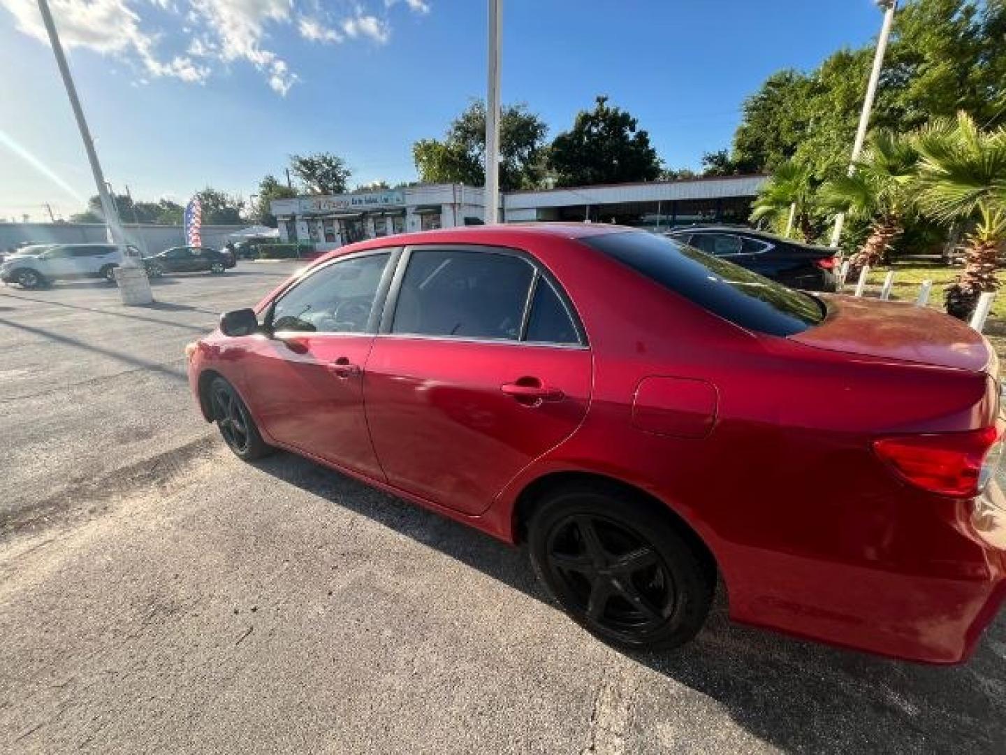 2013 Barcelona Red Metall /Ash Toyota Corolla LE (5YFBU4EE6DP) with an 1.8L I-4 DOHC engine, located at 4545 Spencer Hwy., Pasadena, 77504, (832) 266-1645, 29.666037, -95.173775- Photo#4