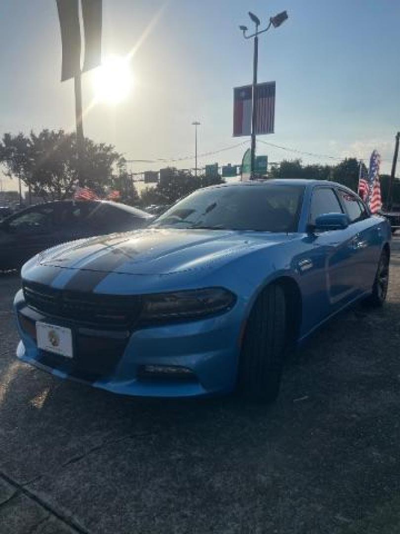 2015 Jazz Blue Pearlcoat /Black Dodge Charger SXT (2C3CDXHG5FH) with an 3.6L V-6 DOHC engine, located at 7935 Gulf Freeway, Houston, 77017, (832) 266-1645, 29.684393, -95.275665 - Photo#2