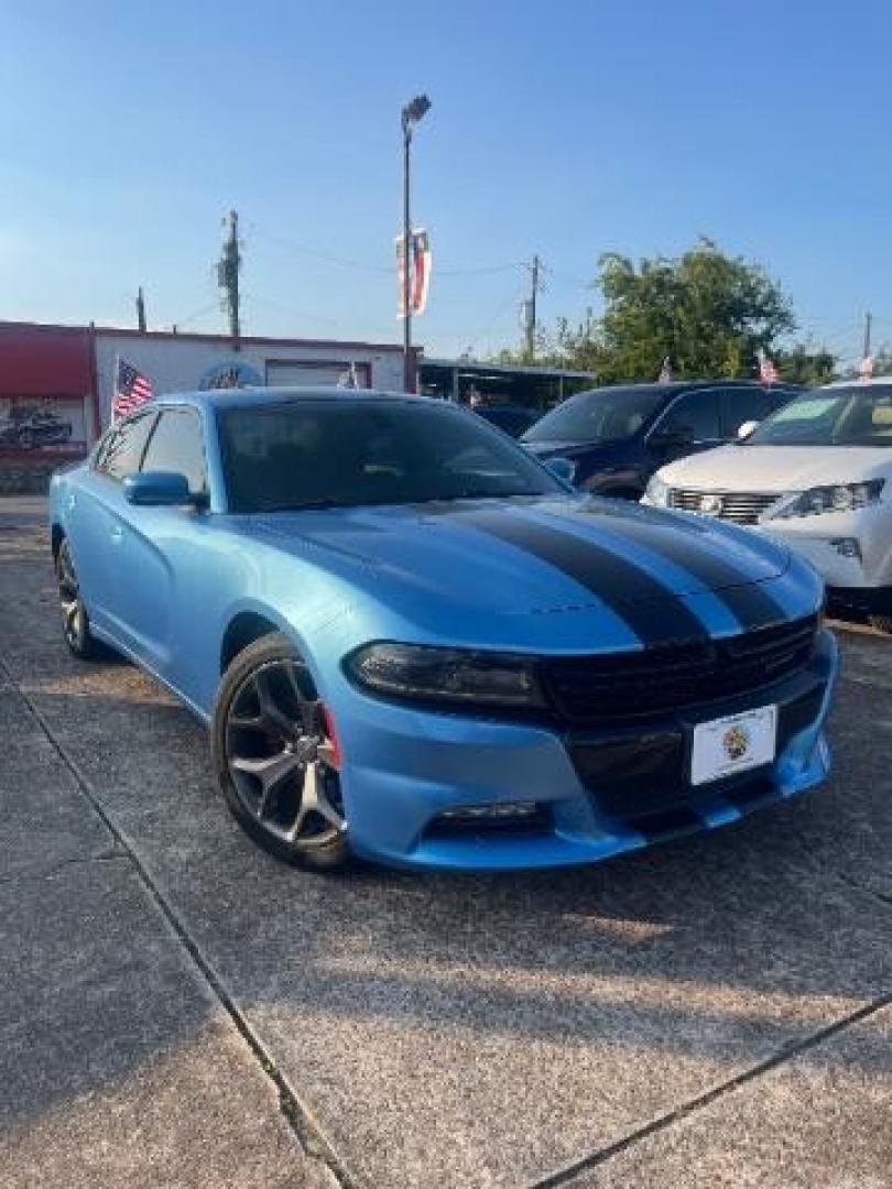 2015 Jazz Blue Pearlcoat /Black Dodge Charger SXT (2C3CDXHG5FH) with an 3.6L V-6 DOHC engine, located at 7935 Gulf Freeway, Houston, 77017, (832) 266-1645, 29.684393, -95.275665 - Photo#0