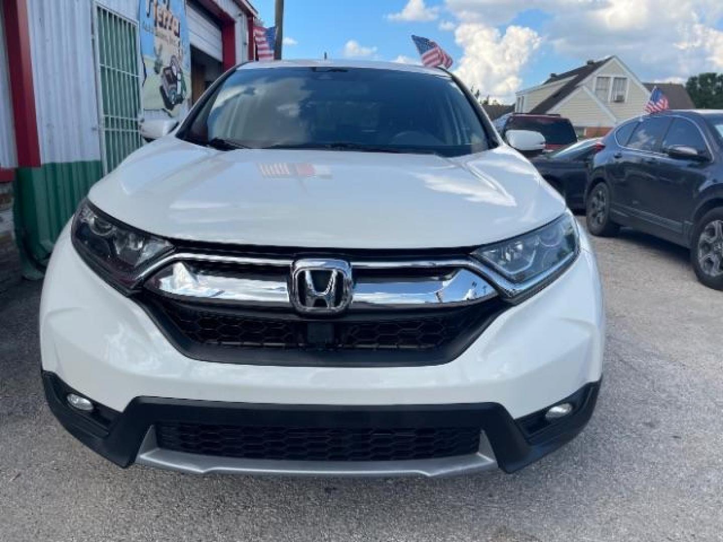 2019 Platinum White Pearl Honda CR-V EX-L (5J6RW1H89KA) with an 1.5L I-4 gasoline direct injection engine, located at 7935 Gulf Freeway, Houston, 77017, (832) 266-1645, 29.684393, -95.275665 - Photo#1