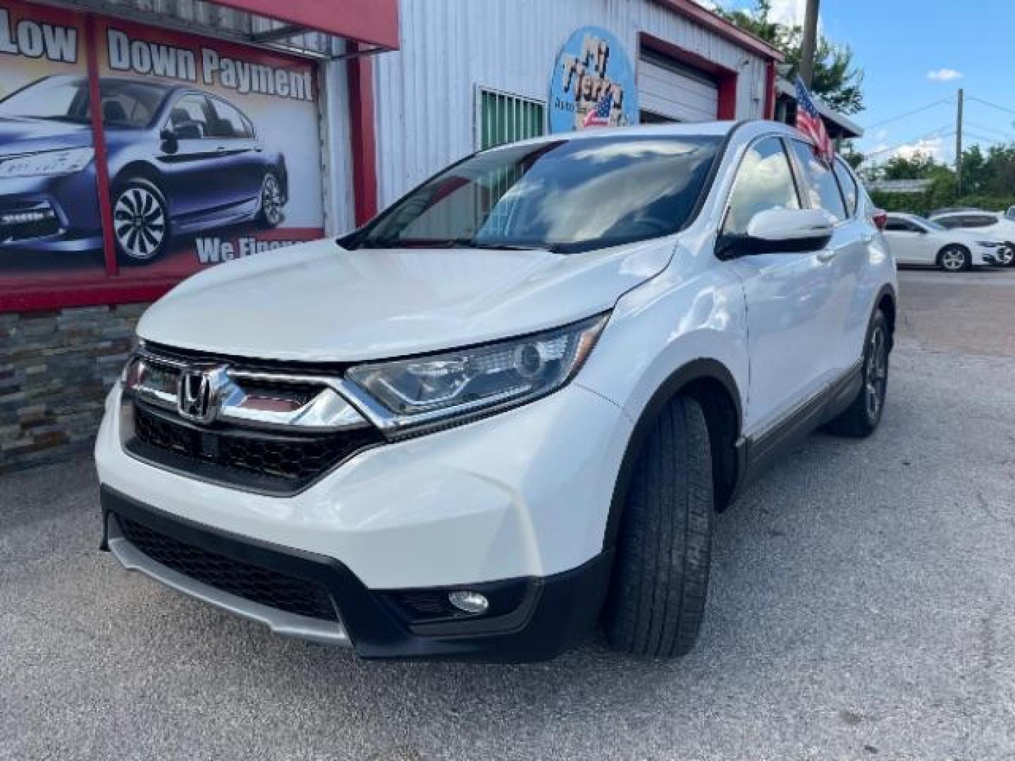 2019 Platinum White Pearl Honda CR-V EX-L (5J6RW1H89KA) with an 1.5L I-4 gasoline direct injection engine, located at 7935 Gulf Freeway, Houston, 77017, (832) 266-1645, 29.684393, -95.275665 - Photo#2