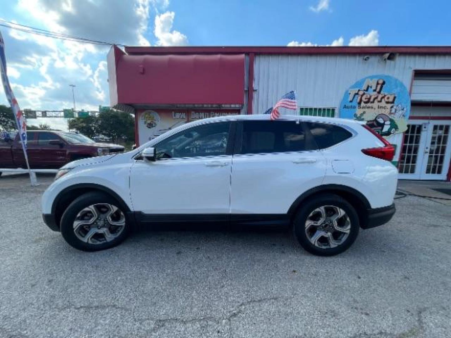 2019 Platinum White Pearl Honda CR-V EX-L (5J6RW1H89KA) with an 1.5L I-4 gasoline direct injection engine, located at 7935 Gulf Freeway, Houston, 77017, (832) 266-1645, 29.684393, -95.275665 - Photo#3