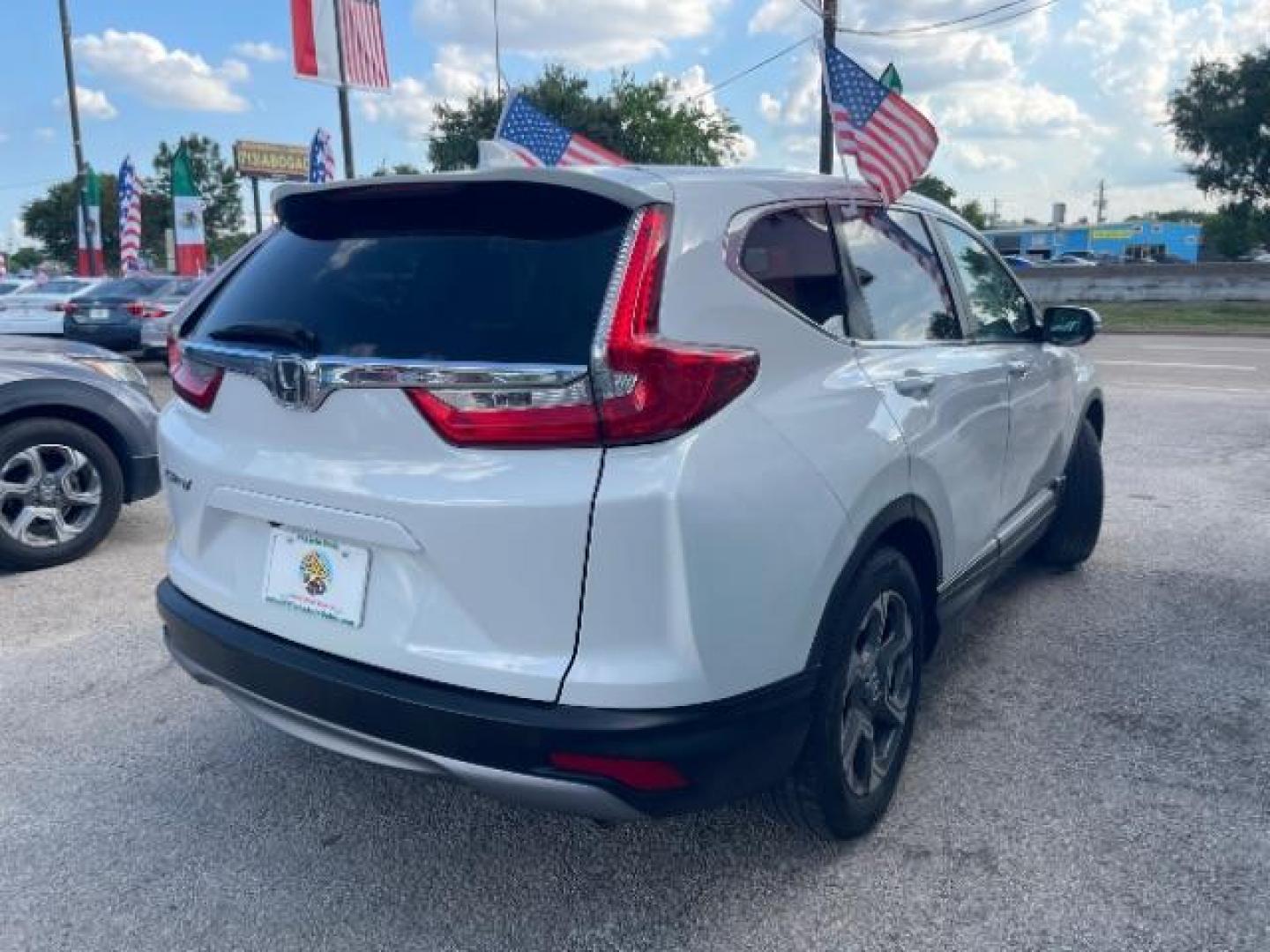 2019 Platinum White Pearl Honda CR-V EX-L (5J6RW1H89KA) with an 1.5L I-4 gasoline direct injection engine, located at 7935 Gulf Freeway, Houston, 77017, (832) 266-1645, 29.684393, -95.275665 - Photo#6