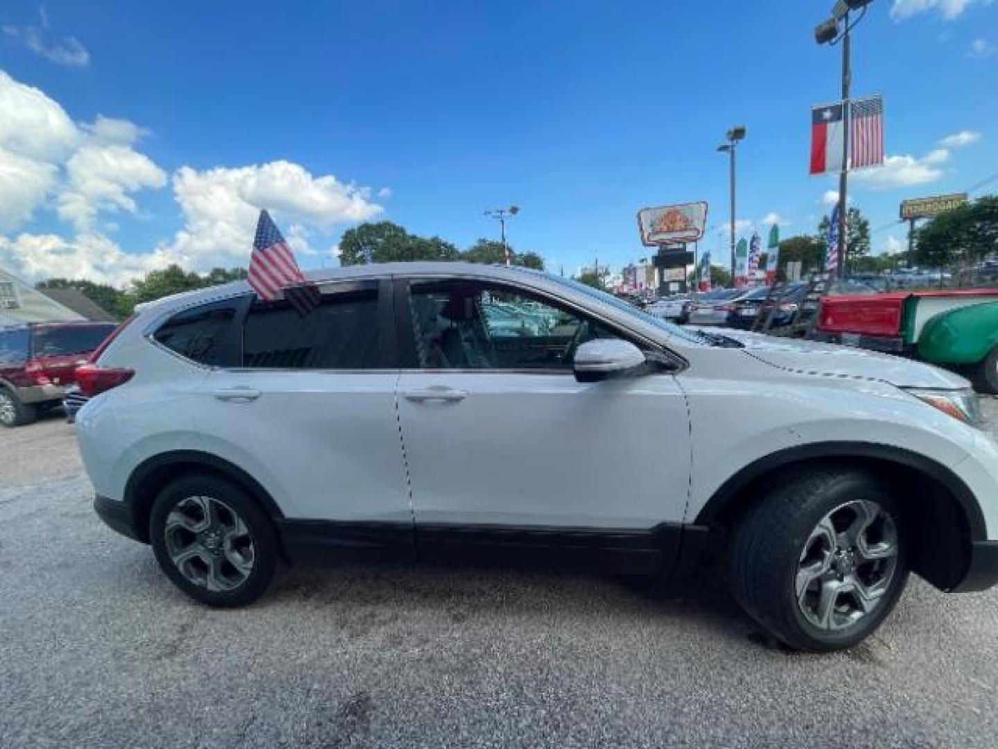 2019 Platinum White Pearl Honda CR-V EX-L (5J6RW1H89KA) with an 1.5L I-4 gasoline direct injection engine, located at 7935 Gulf Freeway, Houston, 77017, (832) 266-1645, 29.684393, -95.275665 - Photo#7