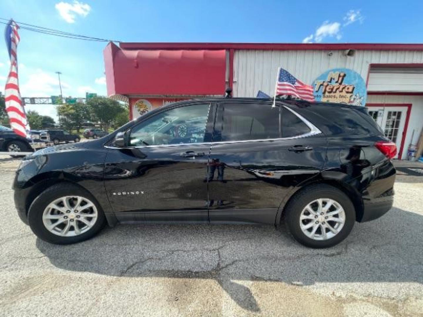 2018 Mosaic Black Metallic Chevrolet Equinox LT (2GNAXJEV6J6) with an 1.5L I-4 gasoline direct injection engine, located at 7935 Gulf Freeway, Houston, 77017, (832) 266-1645, 29.684393, -95.275665 - Photo#16