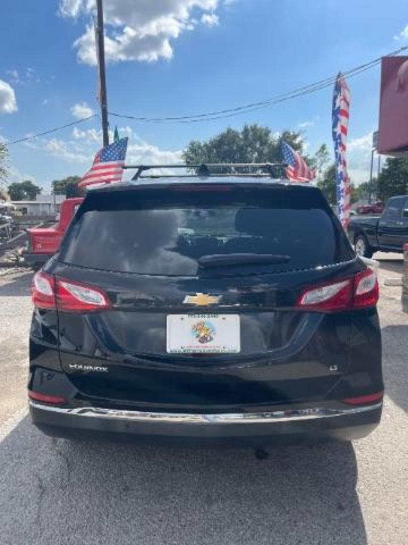 2018 Mosaic Black Metallic Chevrolet Equinox LT (2GNAXJEV6J6) with an 1.5L I-4 gasoline direct injection engine, located at 7935 Gulf Freeway, Houston, 77017, (832) 266-1645, 29.684393, -95.275665 - Photo#18
