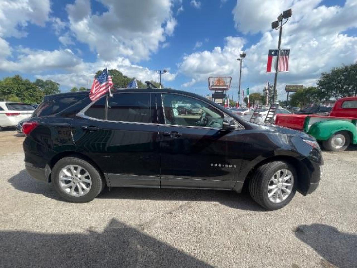 2018 Mosaic Black Metallic Chevrolet Equinox LT (2GNAXJEV6J6) with an 1.5L I-4 gasoline direct injection engine, located at 7935 Gulf Freeway, Houston, 77017, (832) 266-1645, 29.684393, -95.275665 - Photo#20