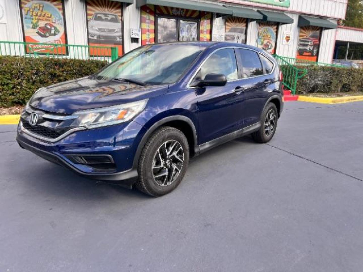 2016 Obsidian Blue Pearl /Beige Honda CR-V SE (2HKRM3H44GH) with an 2.4L I-4 gasoline direct injection engine, located at 4545 Spencer Hwy., Pasadena, 77504, (832) 266-1645, 29.666037, -95.173775 - Photo#0