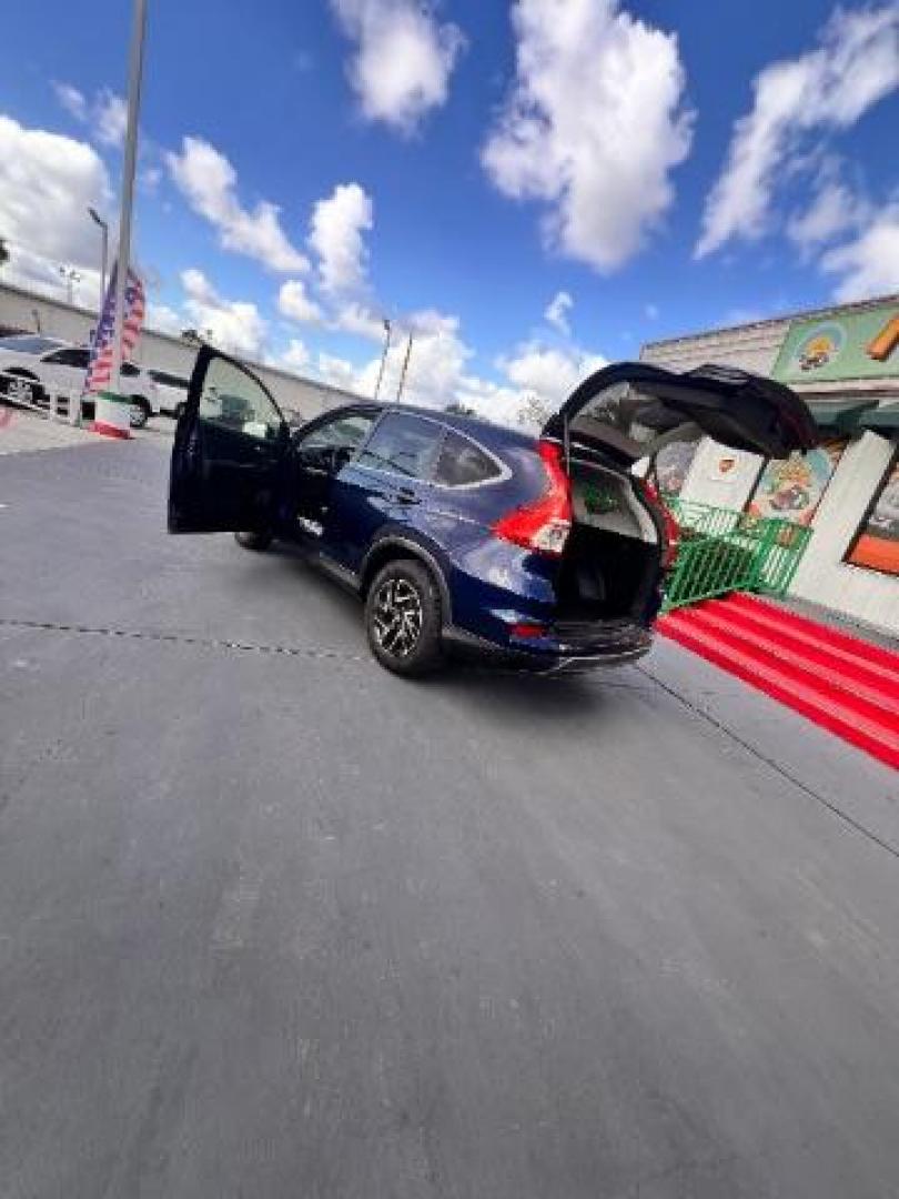2016 Obsidian Blue Pearl /Beige Honda CR-V SE (2HKRM3H44GH) with an 2.4L I-4 gasoline direct injection engine, located at 4545 Spencer Hwy., Pasadena, 77504, (832) 266-1645, 29.666037, -95.173775 - Photo#12