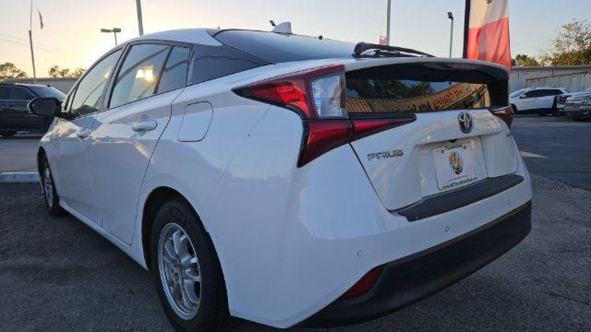 2020 Super White /Moonstone Toyota Prius LE (JTDKARFU1L3) with an 1.8L I-4 DOHC engine, located at 4545 Spencer Hwy., Pasadena, 77504, (832) 266-1645, 29.666037, -95.173775 - Photo#2