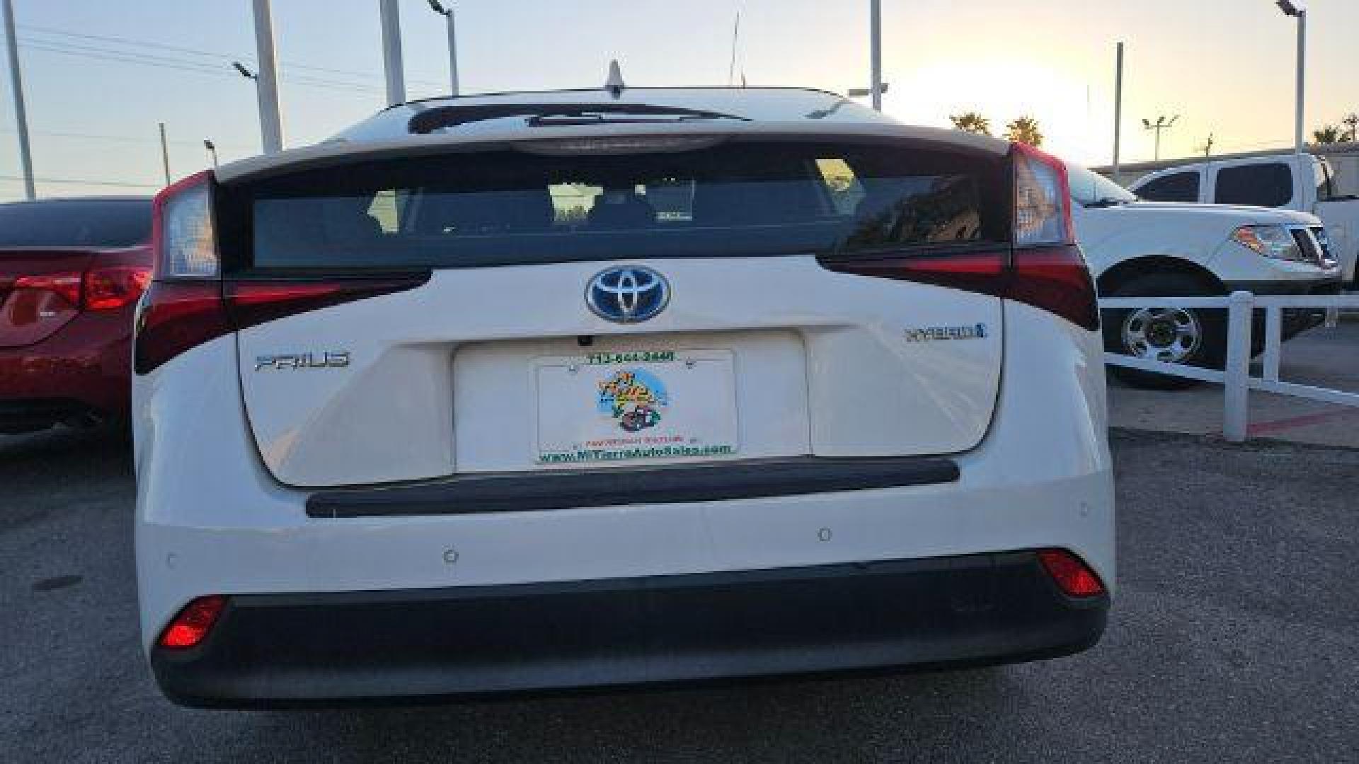 2020 Super White /Moonstone Toyota Prius LE (JTDKARFU1L3) with an 1.8L I-4 DOHC engine, located at 4545 Spencer Hwy., Pasadena, 77504, (832) 266-1645, 29.666037, -95.173775 - Photo#3