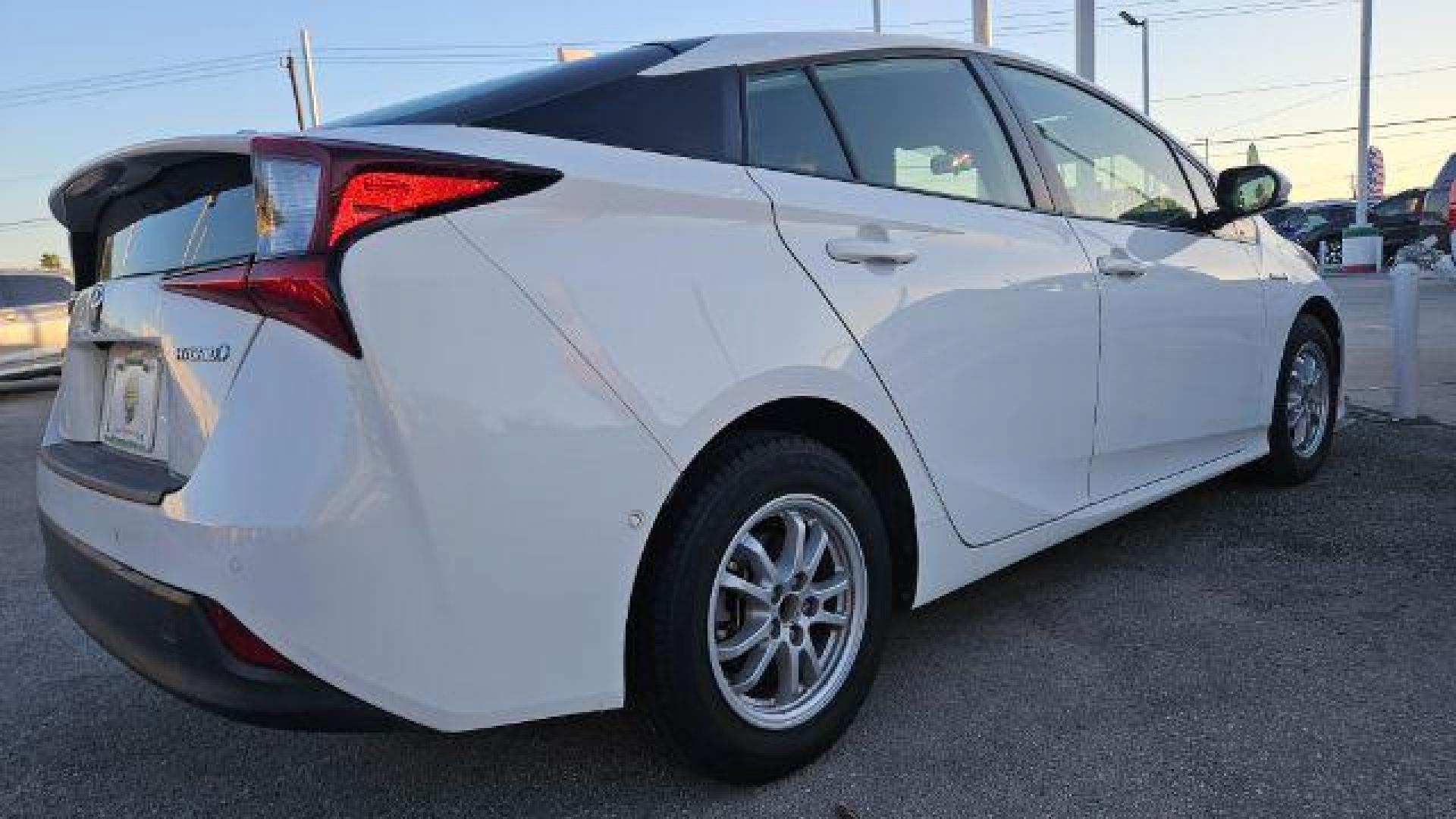 2020 Super White /Moonstone Toyota Prius LE (JTDKARFU1L3) with an 1.8L I-4 DOHC engine, located at 4545 Spencer Hwy., Pasadena, 77504, (832) 266-1645, 29.666037, -95.173775 - Photo#4