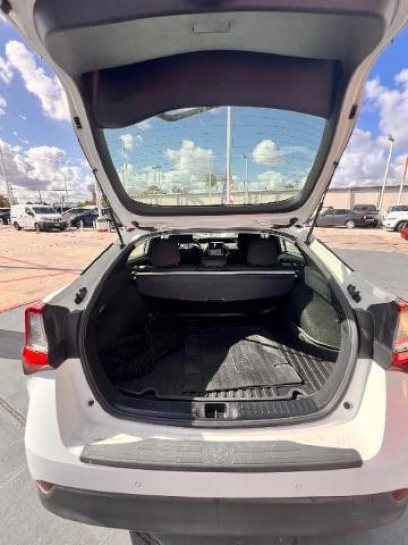 2020 Super White /Moonstone Toyota Prius LE (JTDKARFU1L3) with an 1.8L I-4 DOHC engine, located at 4545 Spencer Hwy., Pasadena, 77504, (832) 266-1645, 29.666037, -95.173775 - Photo#12