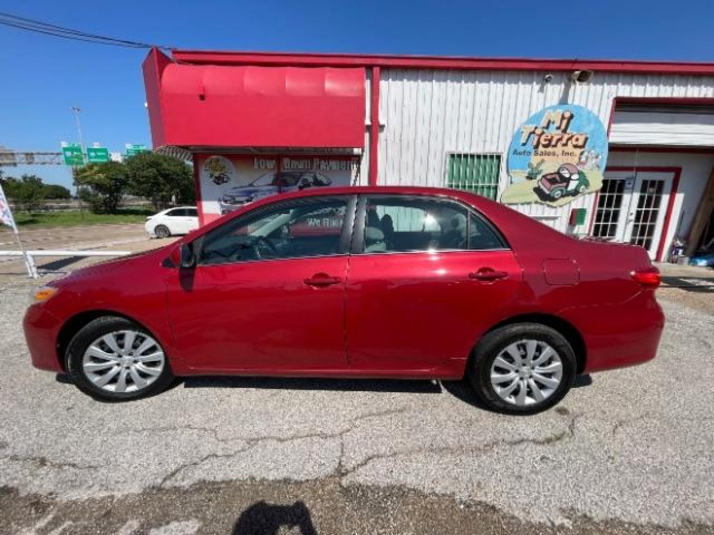 2013 Barcelona Red Metallic Toyota Corolla LE (2T1BU4EE6DC) with an 1.8L I-4 DOHC engine, located at 7935 Gulf Freeway, Houston, 77017, (832) 266-1645, 29.684393, -95.275665 - Photo#3