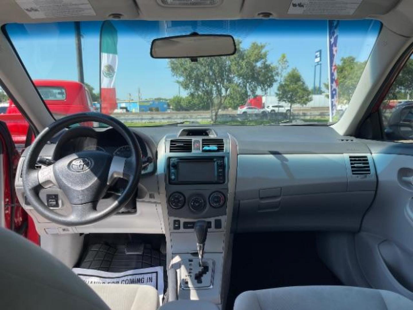 2013 Barcelona Red Metallic Toyota Corolla LE (2T1BU4EE6DC) with an 1.8L I-4 DOHC engine, located at 7935 Gulf Freeway, Houston, 77017, (832) 266-1645, 29.684393, -95.275665 - Photo#10