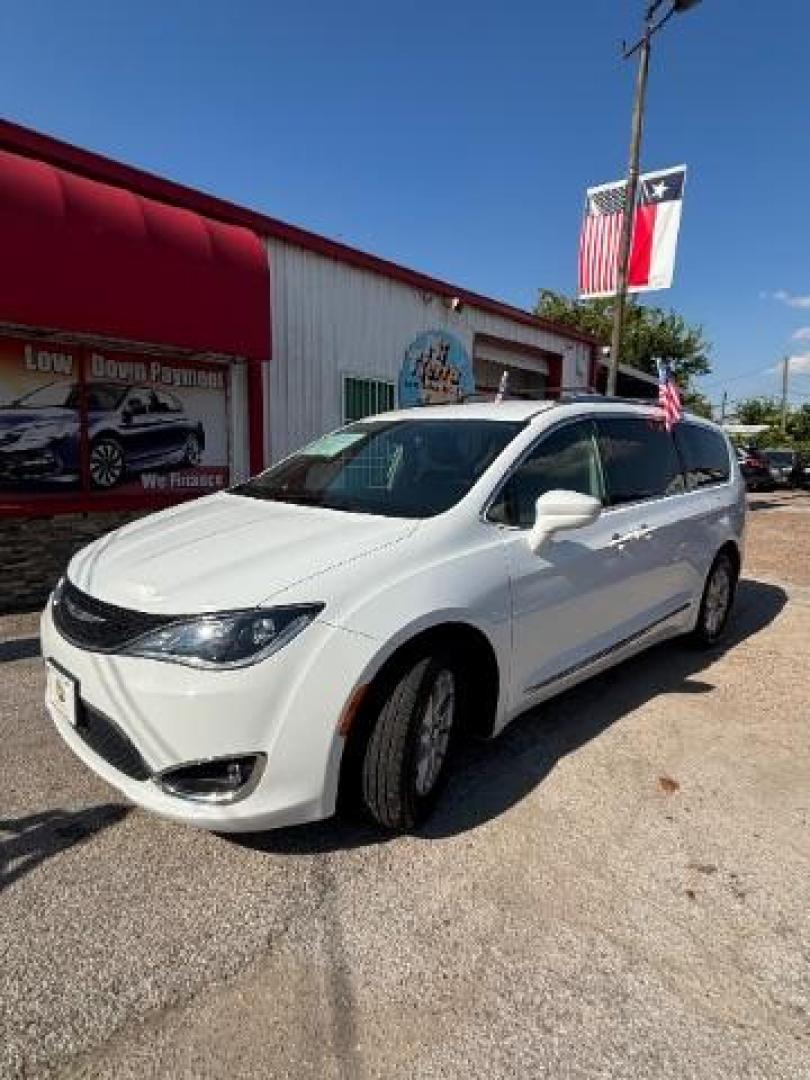 2020 Bright White Clearcoat Chrysler Pacifica Touring L (2C4RC1BG5LR) with an 3.6L V-6 DOHC engine, located at 7935 Gulf Freeway, Houston, 77017, (832) 266-1645, 29.684393, -95.275665 - Photo#2