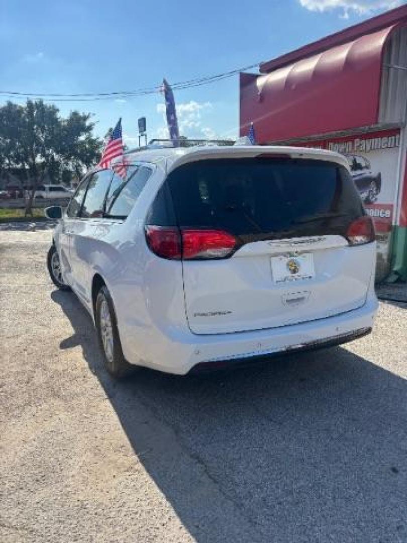 2020 Bright White Clearcoat Chrysler Pacifica Touring L (2C4RC1BG5LR) with an 3.6L V-6 DOHC engine, located at 7935 Gulf Freeway, Houston, 77017, (832) 266-1645, 29.684393, -95.275665 - Photo#4