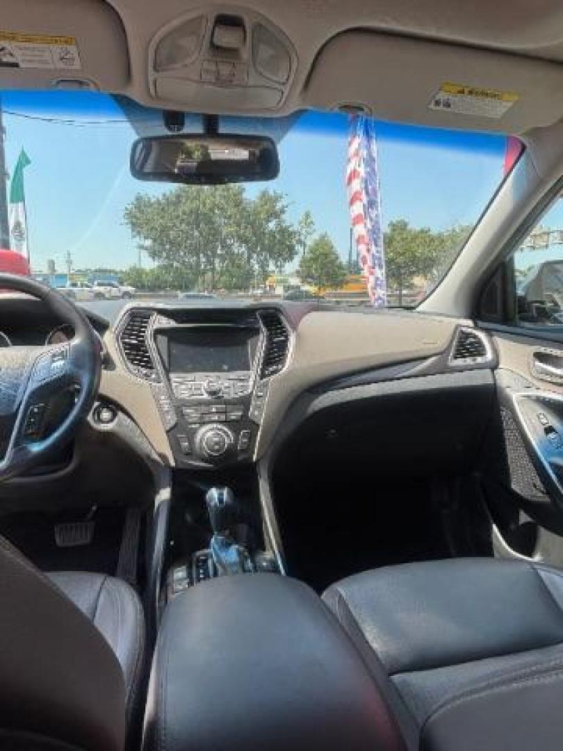 2014 Iron Frost Hyundai Santa Fe Limited (KM8SR4HFXEU) with an Lambda II 3.3L V-6 gasoline direct injection engine, located at 7935 Gulf Freeway, Houston, 77017, (832) 266-1645, 29.684393, -95.275665 - Photo#13