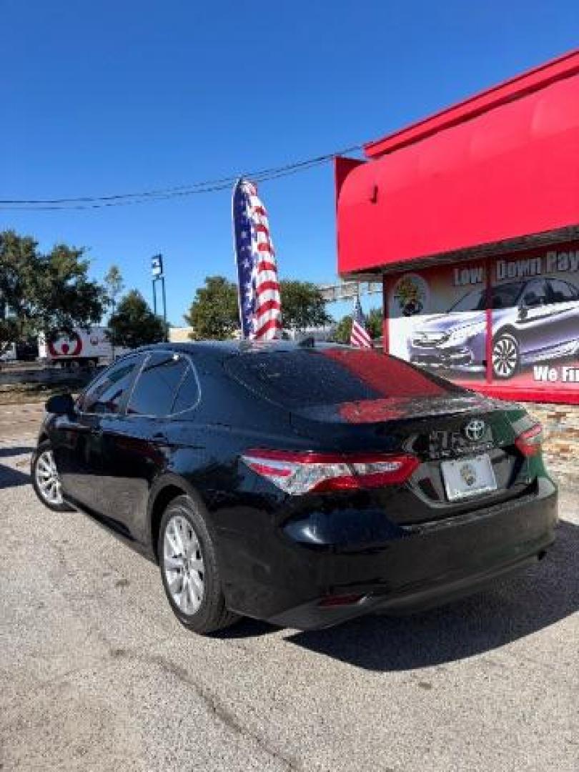 2019 Midnight Black Metallic Toyota Camry LE (4T1B11HK3KU) with an Dynamic Force 2.5L I-4 port/direct injection engine, located at 7935 Gulf Freeway, Houston, 77017, (832) 266-1645, 29.684393, -95.275665 - Photo#4