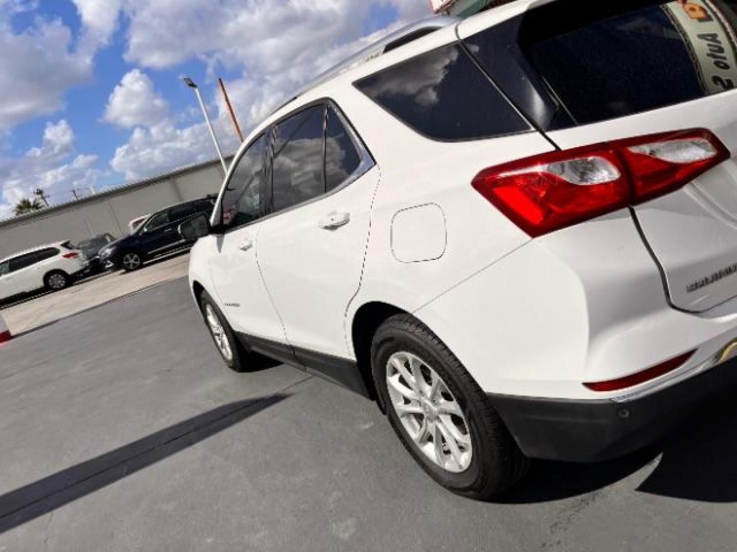 2018 Summit White /Medium Ash Gray Chevrolet Equinox LT (2GNAXJEV9J6) with an 1.5L I-4 gasoline direct injection engine, located at 4545 Spencer Hwy., Pasadena, 77504, (832) 266-1645, 29.666037, -95.173775 - Photo#6