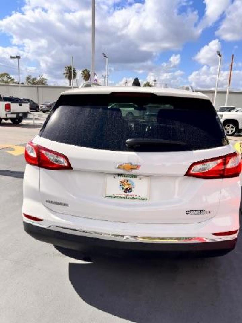 2018 Summit White /Medium Ash Gray Chevrolet Equinox LT (2GNAXJEV9J6) with an 1.5L I-4 gasoline direct injection engine, located at 4545 Spencer Hwy., Pasadena, 77504, (832) 266-1645, 29.666037, -95.173775 - Photo#7