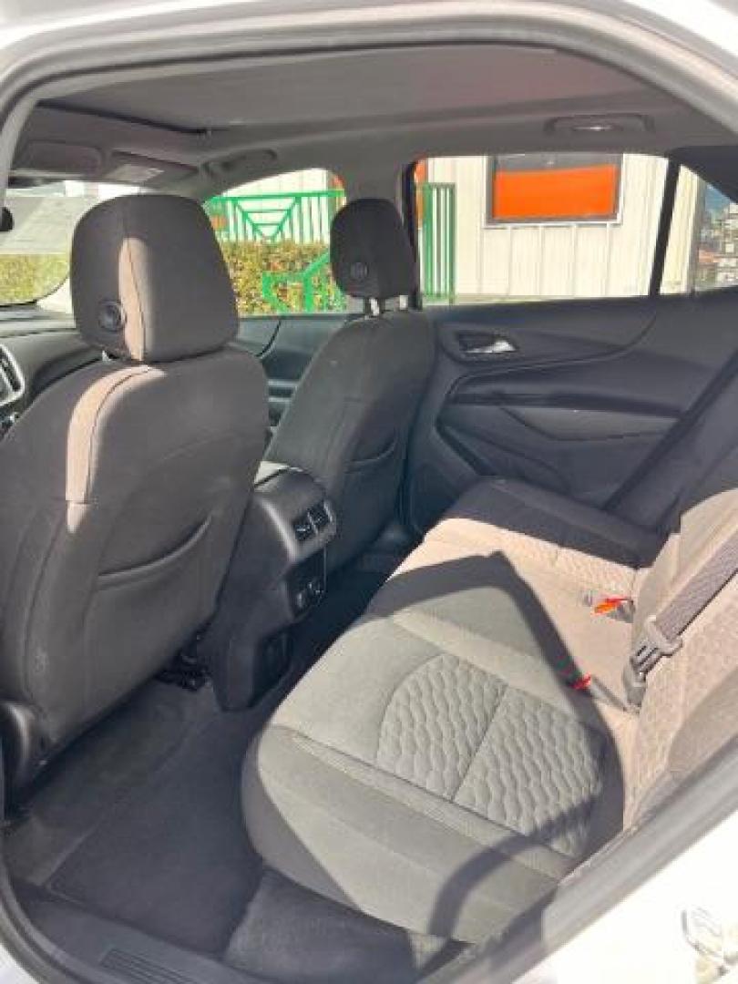 2018 Summit White /Medium Ash Gray Chevrolet Equinox LT (2GNAXJEV9J6) with an 1.5L I-4 gasoline direct injection engine, located at 4545 Spencer Hwy., Pasadena, 77504, (832) 266-1645, 29.666037, -95.173775 - Photo#8