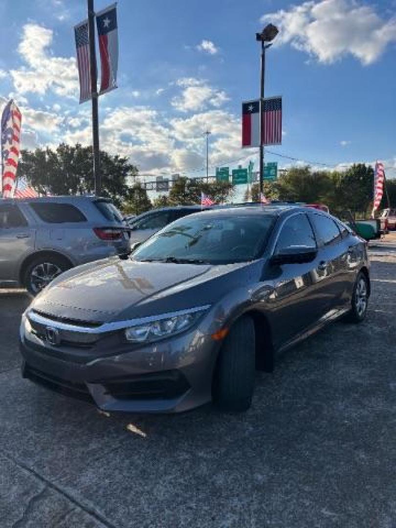 2018 Modern Steel Metallic /Black, cloth Honda Civic LX Sedan CVT (2HGFC2F56JH) with an 2.0L L4 DOHC 16V engine, Continuously Variable Transmission transmission, located at 7935 Gulf Freeway, Houston, 77017, (832) 266-1645, 29.684393, -95.275665 - Photo#2
