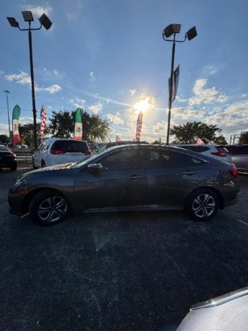 2018 Modern Steel Metallic /Black, cloth Honda Civic LX Sedan CVT (2HGFC2F56JH) with an 2.0L L4 DOHC 16V engine, Continuously Variable Transmission transmission, located at 7935 Gulf Freeway, Houston, 77017, (832) 266-1645, 29.684393, -95.275665 - Photo#3