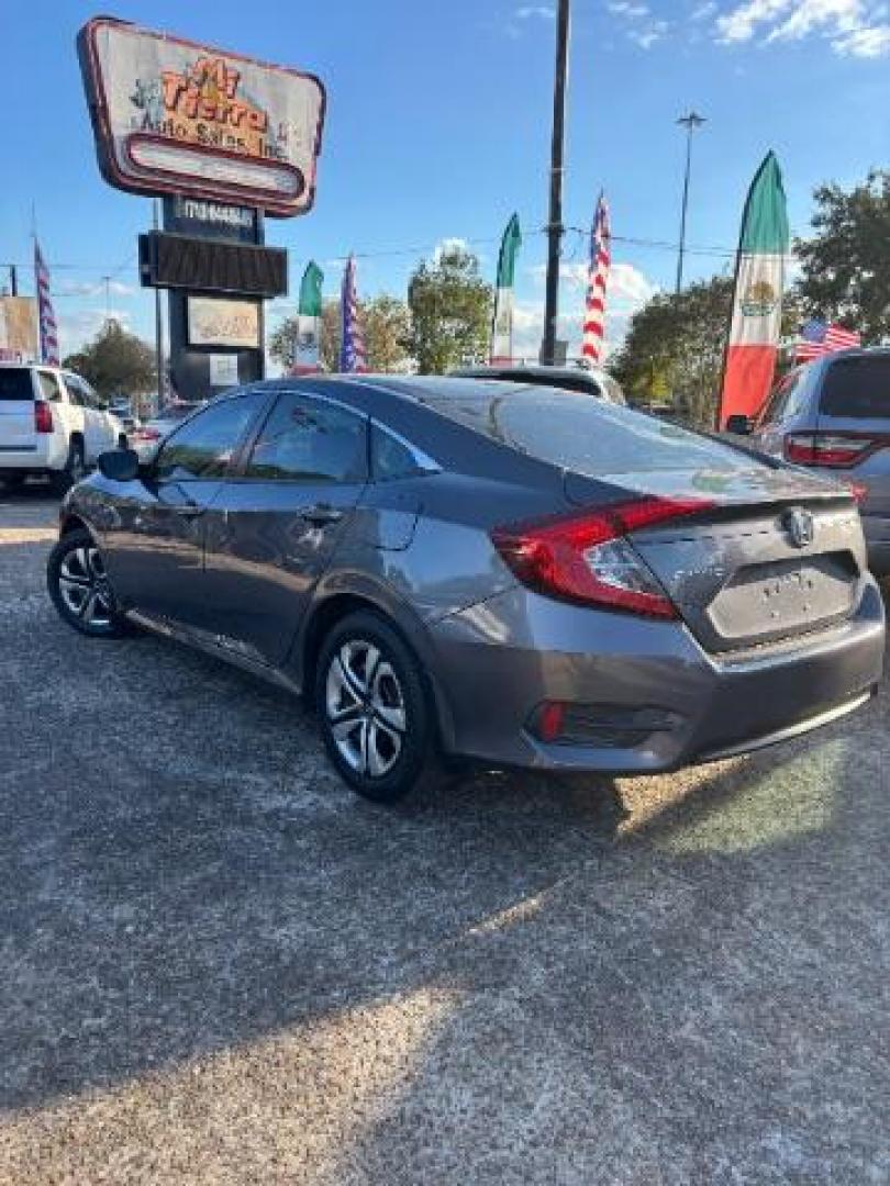 2018 Modern Steel Metallic /Black, cloth Honda Civic LX Sedan CVT (2HGFC2F56JH) with an 2.0L L4 DOHC 16V engine, Continuously Variable Transmission transmission, located at 7935 Gulf Freeway, Houston, 77017, (832) 266-1645, 29.684393, -95.275665 - Photo#4