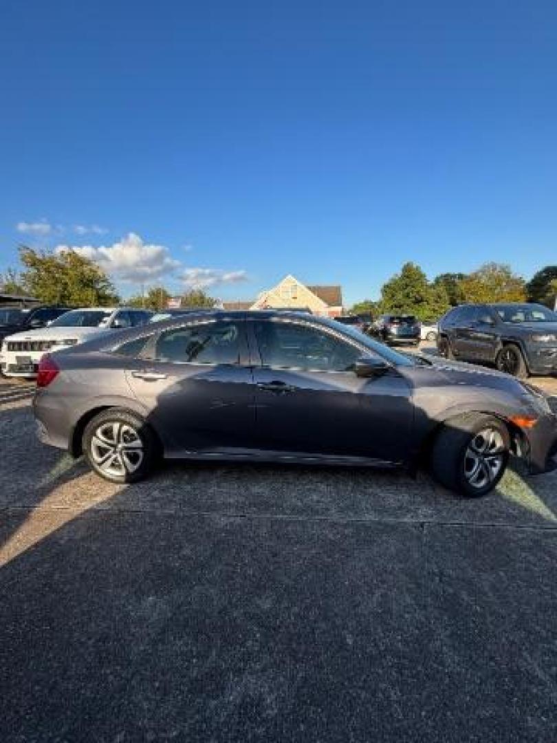 2018 Modern Steel Metallic /Black, cloth Honda Civic LX Sedan CVT (2HGFC2F56JH) with an 2.0L L4 DOHC 16V engine, Continuously Variable Transmission transmission, located at 7935 Gulf Freeway, Houston, 77017, (832) 266-1645, 29.684393, -95.275665 - Photo#7