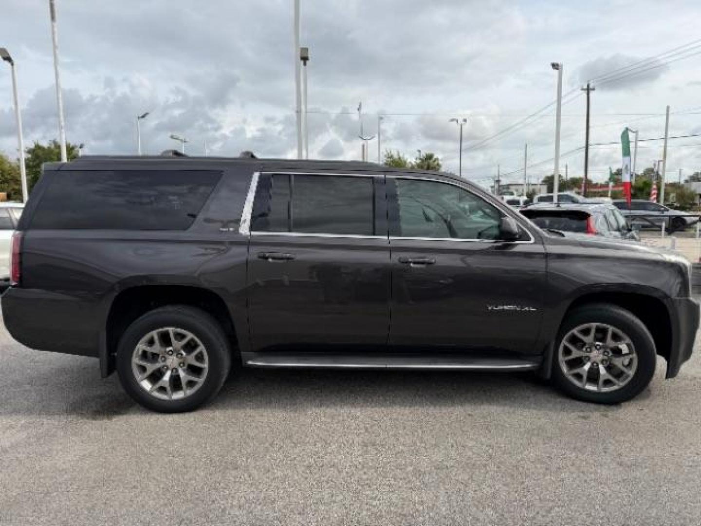 2015 GMC Yukon XL 1500 SLT (1GKS1HKC1FR) with an EcoTec3 5.3L V-8 gasoline direct injection engine, located at 4545 Spencer Hwy., Pasadena, 77504, (832) 266-1645, 29.666037, -95.173775 - Photo#3