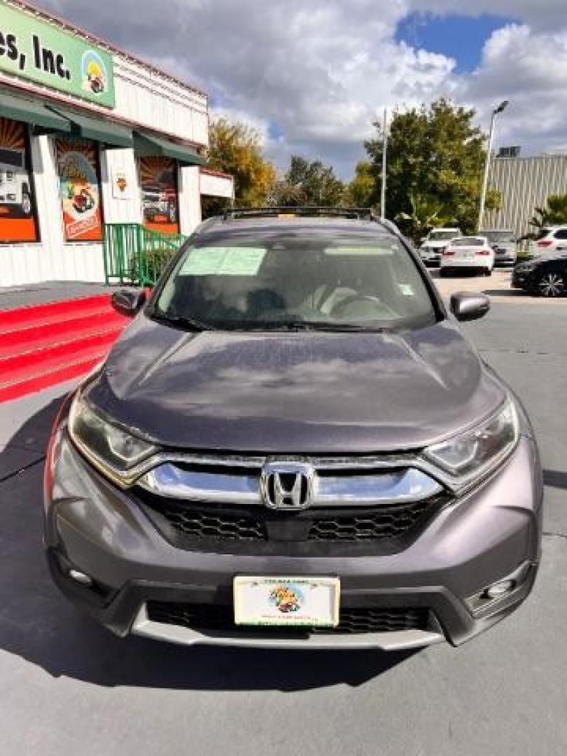 2017 Lunar Silver Metallic /Black Honda CR-V EX-L | EX-L Navi (7FARW1H86HE) with an 1.5L I-4 gasoline direct injection engine, located at 4545 Spencer Hwy., Pasadena, 77504, (832) 266-1645, 29.666037, -95.173775 - Photo#1