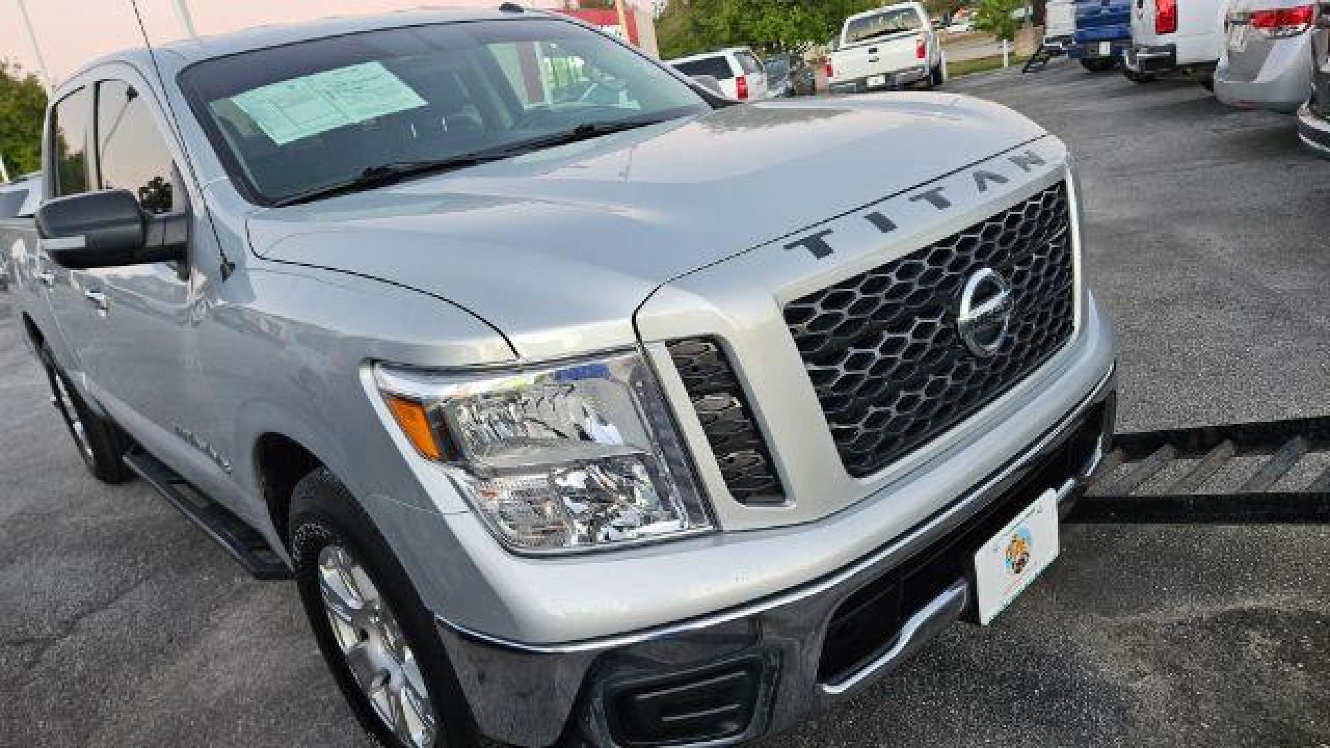 2019 Brilliant Silver Metallic /Black Nissan TITAN SV (1N6AA1EK2KN) with an Endurance 5.6L V-8 gasoline direct injection engine, located at 4545 Spencer Hwy., Pasadena, 77504, (832) 266-1645, 29.666037, -95.173775 - Photo#2