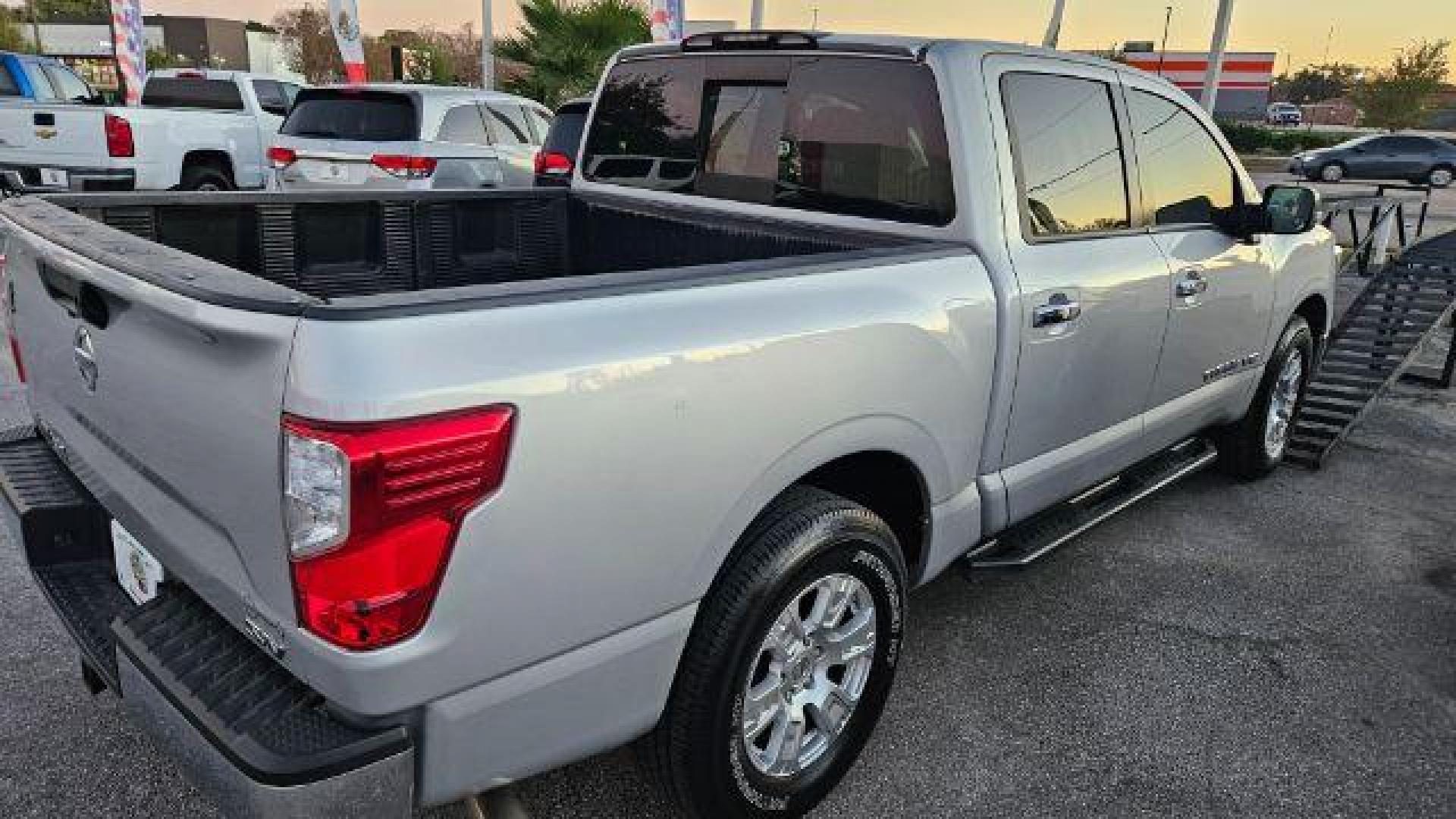2019 Brilliant Silver Metallic /Black Nissan TITAN SV (1N6AA1EK2KN) with an Endurance 5.6L V-8 gasoline direct injection engine, located at 4545 Spencer Hwy., Pasadena, 77504, (832) 266-1645, 29.666037, -95.173775 - Photo#5