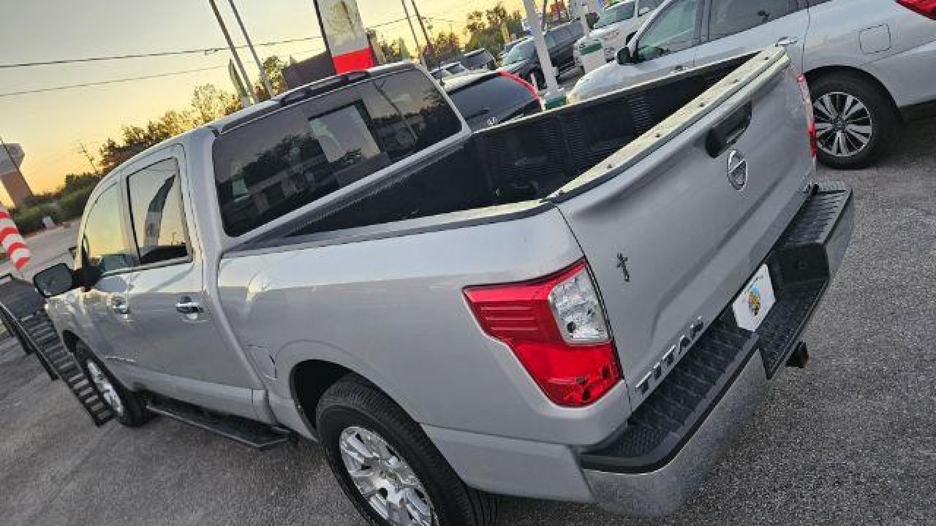 2019 Brilliant Silver Metallic /Black Nissan TITAN SV (1N6AA1EK2KN) with an Endurance 5.6L V-8 gasoline direct injection engine, located at 4545 Spencer Hwy., Pasadena, 77504, (832) 266-1645, 29.666037, -95.173775 - Photo#11