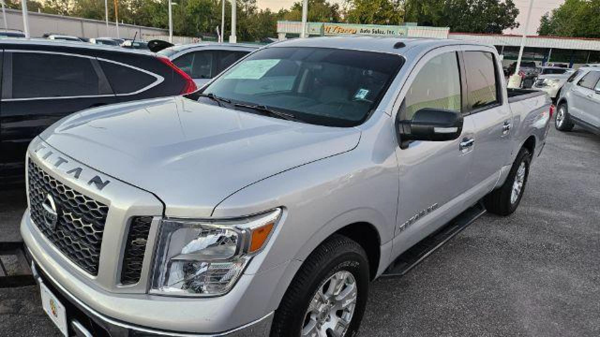 2019 Brilliant Silver Metallic /Black Nissan TITAN SV (1N6AA1EK2KN) with an Endurance 5.6L V-8 gasoline direct injection engine, located at 4545 Spencer Hwy., Pasadena, 77504, (832) 266-1645, 29.666037, -95.173775 - Photo#17